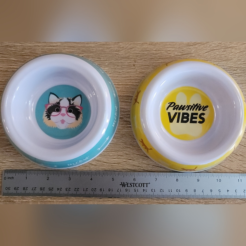 Pawsative Cat bowls yellow blue white cat glasses fish meow design